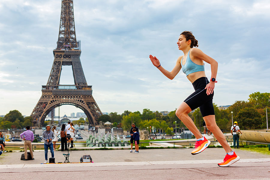 Woman Training for the 2024 Paris Olympics in Front of the Eiffel Tower